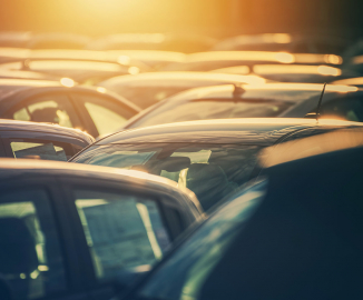 group of cars in a rental facility